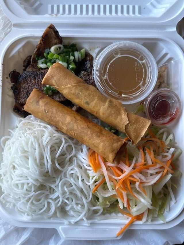 #36 Grilled Pork & Egg Rolls Over Vermicelli.