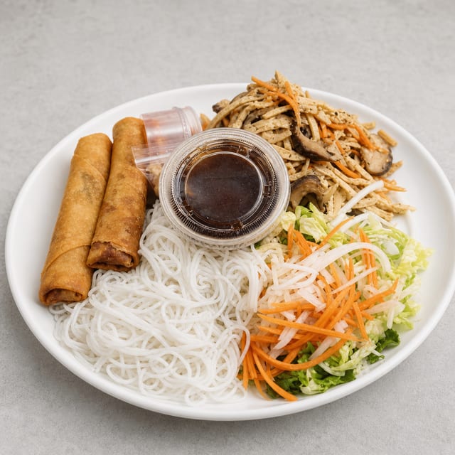 #42 Vegetarian Shredded Tofu, Mushroom, Carrot & Egg Rolls Over Vermicelli.