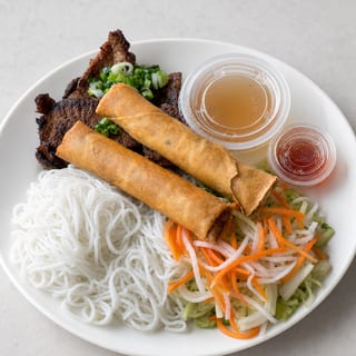 #36 Grilled Pork & Egg Rolls Over Vermicelli