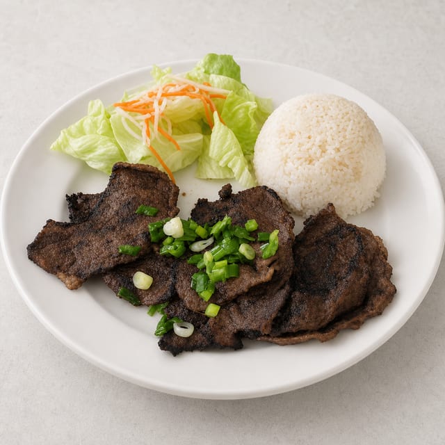 57. Grilled Beef Over Rice / Cơm Bò Nướng.