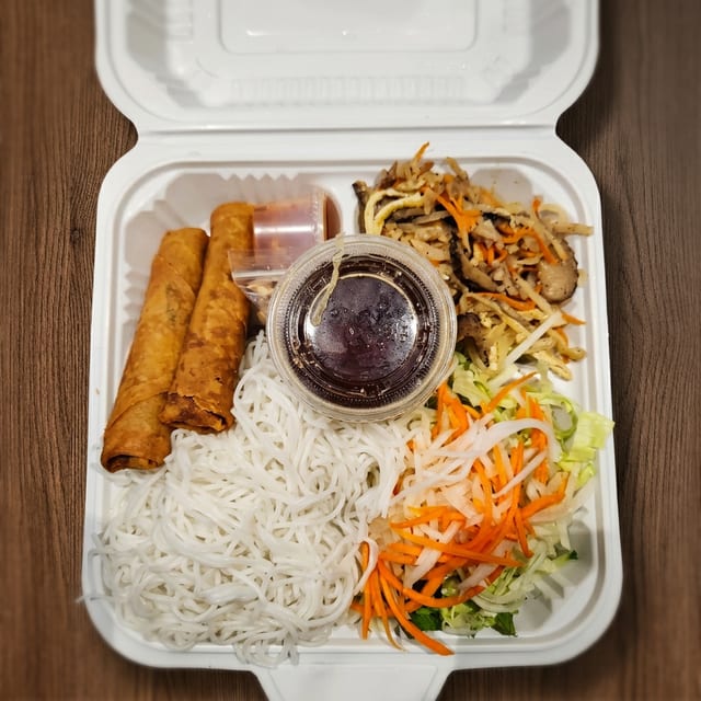 #42 Vegetarian Shredded Tofu, Mushroom, Carrot & Egg Rolls Over Vermicelli.