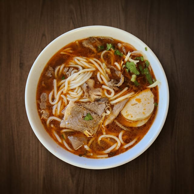 #25 Hot & Spicy Beef with Rice Noodle Soup.